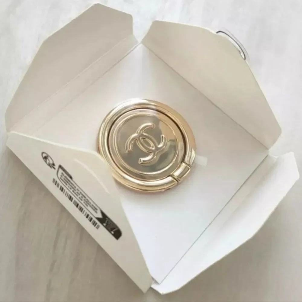 CHANEL INTERLOCHEN CC RING PHONE HOLDER GOLD TONE GWP IN ITS ORIGINAL PA…